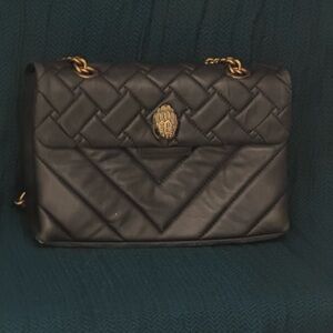 Luxurious Black Quilted Shoulder Bag with Gold Chain